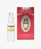 Attar 96 My Choice perfume oil bottle with matching red packaging, clear glass and label visible