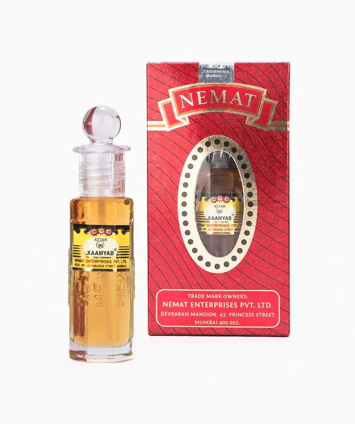Attar Kaamyab fragrance oil bottle with red and gold retail box, clear label, elegant packaging
