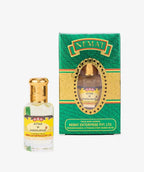 Sandalwood attar perfume bottle with gold cap and matching green gold box packaging