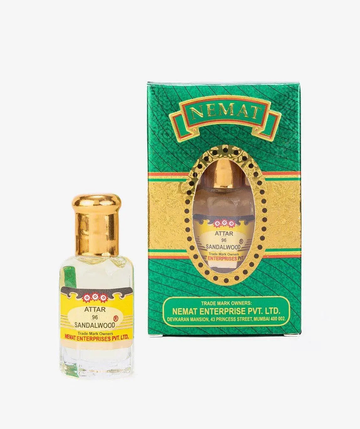 Sandalwood attar perfume bottle with gold cap and matching green gold box packaging