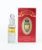 Kashish Attar perfume oil in clear glass bottle with matching red and gold packaging
