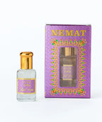 Attar 726 Real Rose perfume oil bottle with gold cap and decorative purple box