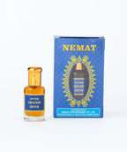 Attar Shaahi Hina perfume bottle with decorative blue and gold packaging box