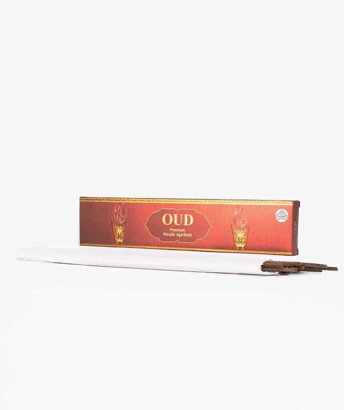 Oud premium masala agarbatti incense sticks with red packaging box on white background