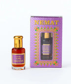Attar 726 Temptation perfume oil bottle with purple and gold box packaging