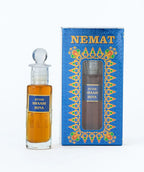 Attar Shaahi Hina perfume oil bottle with decorative blue packaging