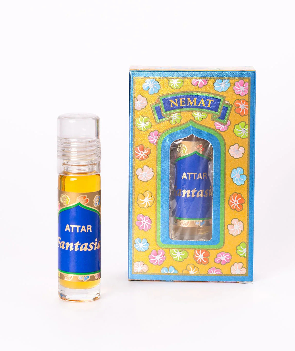 Attar Fantasia perfume oil bottle with decorative floral box on white background