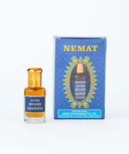 Attar Shaahi Shamama perfume oil bottle and decorative blue packaging box