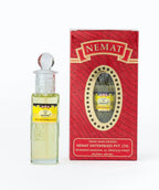Sandalwood attar perfume oil in glass bottle with red packaging box, clear label