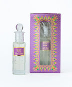 Attar 726 Real Rose perfume oil bottle with decorative purple box on white background