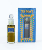 Attar Shaahi Majmua perfume oil bottle with decorative blue packaging